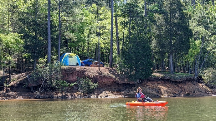 Hamilton_Branch_State_Park_2022_0422_kayaking_our_tent_in_background_edited